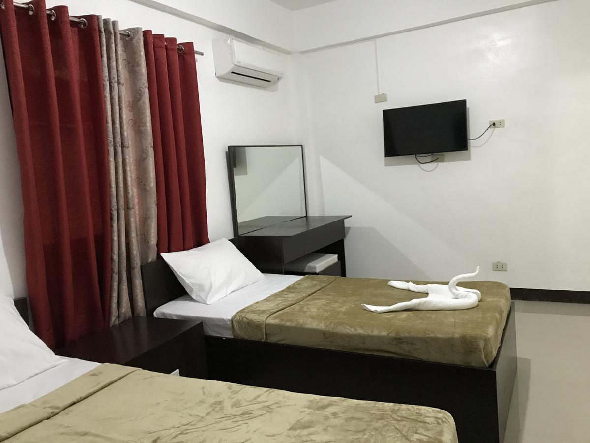 4C'S Tourist Lodge Puerto Princesa Eksteriør bilde