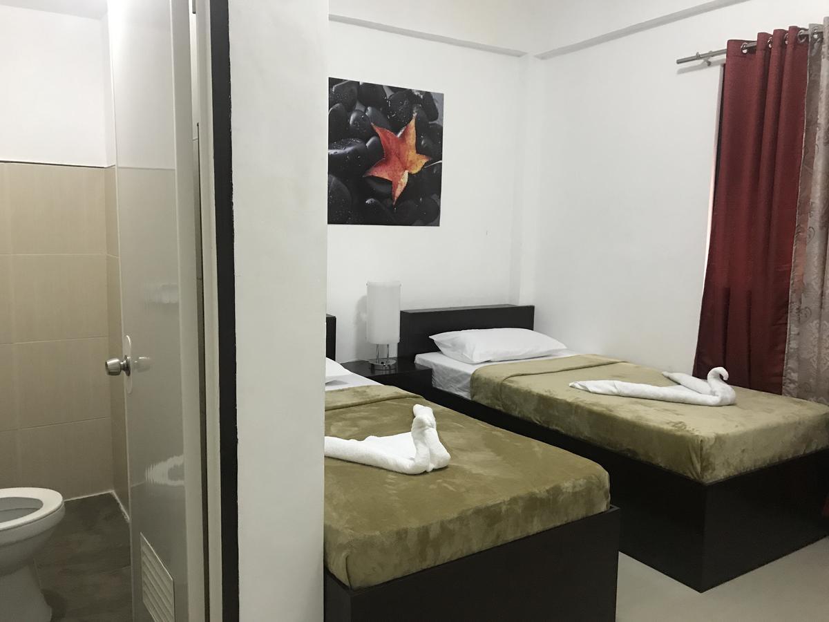 4C'S Tourist Lodge Puerto Princesa Eksteriør bilde