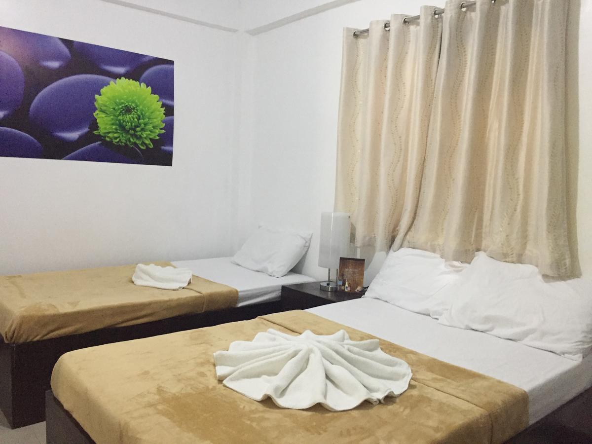 4C'S Tourist Lodge Puerto Princesa Eksteriør bilde
