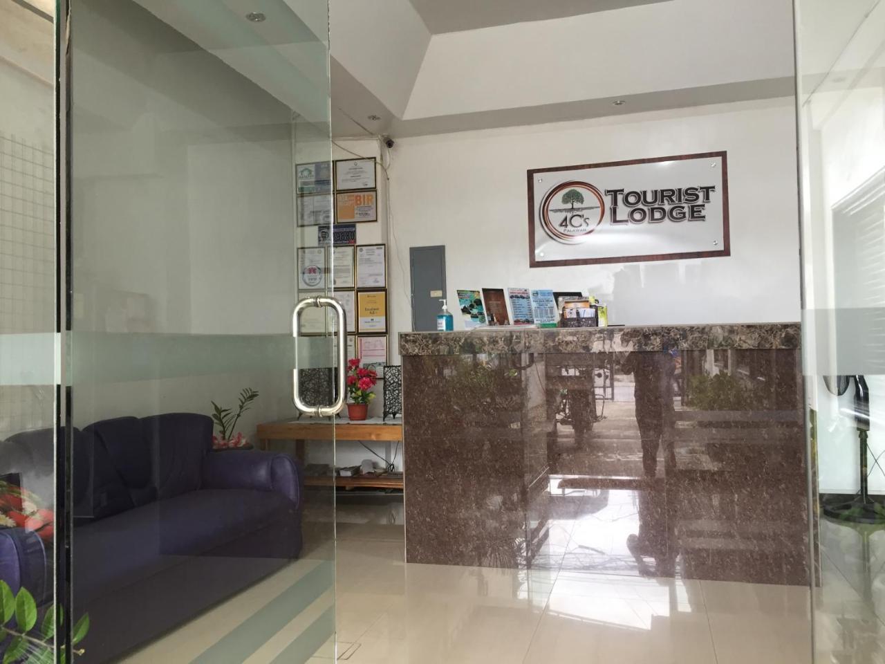 4C'S Tourist Lodge Puerto Princesa Eksteriør bilde